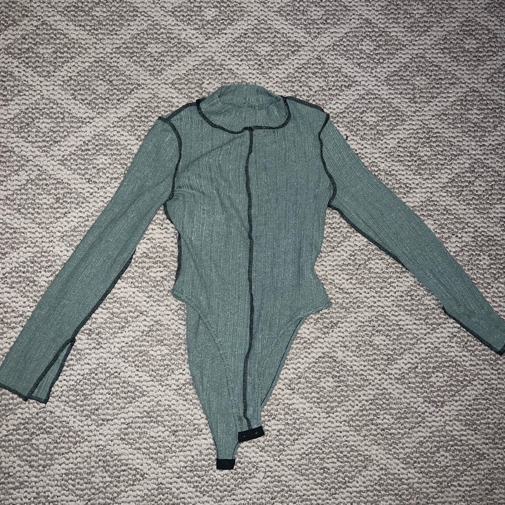 Long sleeved body suit